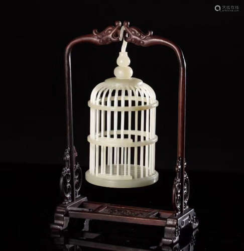 A HETIAN JADE CARVED CRICKET CAGE ORNAMENT