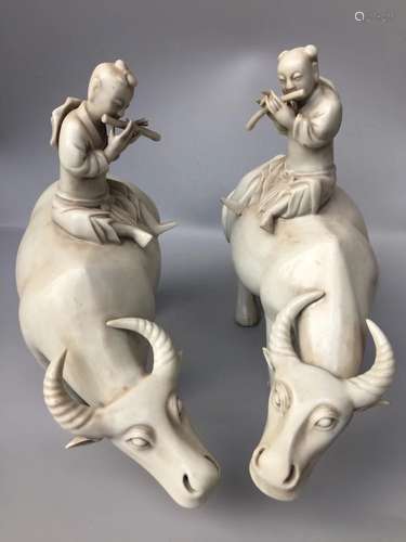 A DEHUA KILN CHILDREN AND COWS FIGURES