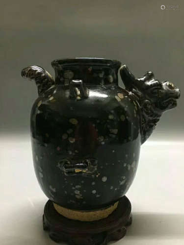 A BLACK-GLAZED JAR