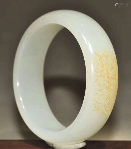 A HETIAN JADE CARVED BANGLE