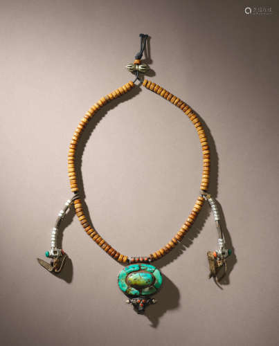 A BONE MALA WITH TURQUOISE INLAID SILVER GAU