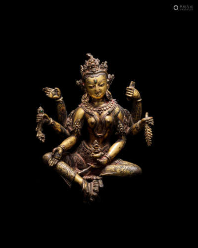 NEPAL, 14TH CENTURY A GILT COPPER FIGURE OF VASUDHARA