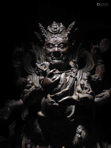 EARLY MING DYNASTY, 15TH CENTURY A COPPER ALLOY FIGURE OF SHADBHUJA MAHAKALA