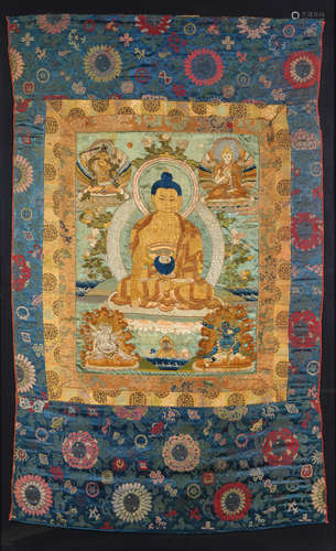 QING DYNASTY, CIRCA 18TH CENTURY  A GOLD EMBROIDERED SILK THANGKA OF SHAKYAMUNI