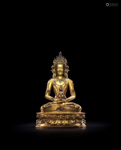 ATTRIBUTED TO SONAM GYALTSEN (A.15TH CENTURY), CENTRAL TIBET, CIRCA 1430-1440 A GILT COPPER ALLOY FIGURE OF AMITAYUS