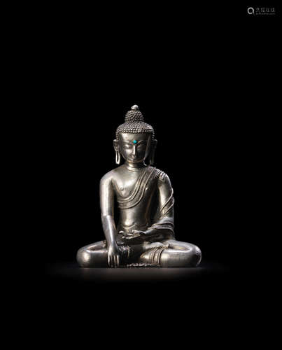 TIBET, 15TH CENTURY A SILVER FIGURE OF BUDDHA