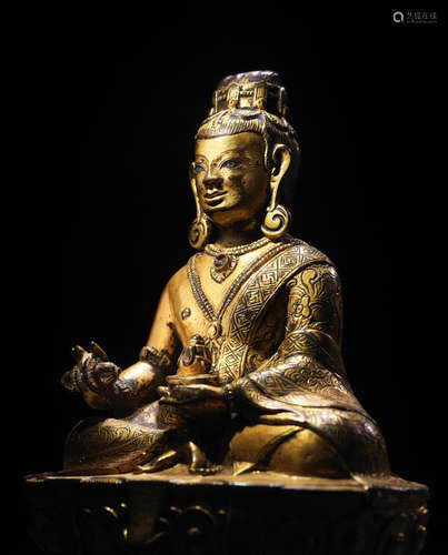 TIBET, 16TH CENTURY A SILVER INLAID GILT COPPER ALLOY FIGUREOF KING KUNZANG NYIDA DRAKPA (1514–1560)