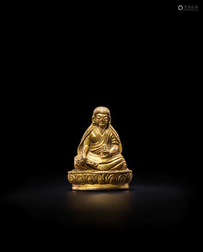 TIBET, CIRCA 16TH CENTURY A GILT COPPER ALLOY FIGURE OF TANGTON GYALPO