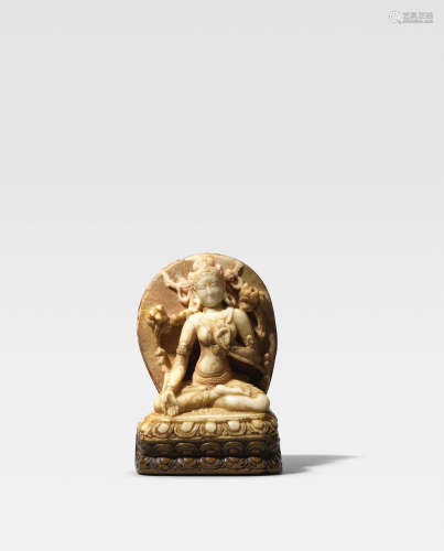 TIBET, CIRCA 12TH CENTURY  A STONE FIGURE OF TARA