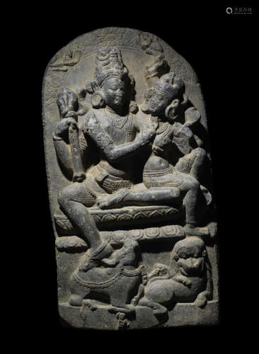 NORTHEASTERN INDIA, PALA PERIOD, 10TH/11TH CENTURY  A BLACKSTONE STELE OF UMA MAHESHVARA