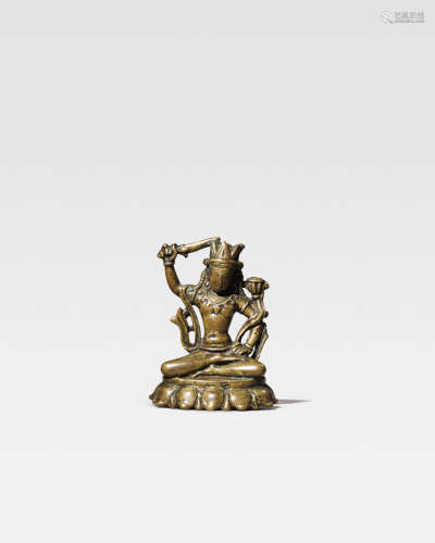 KASHMIR, CIRCA 9TH CENTURY  A BRASS ALLOY FIGURE OF MANJUSHRI