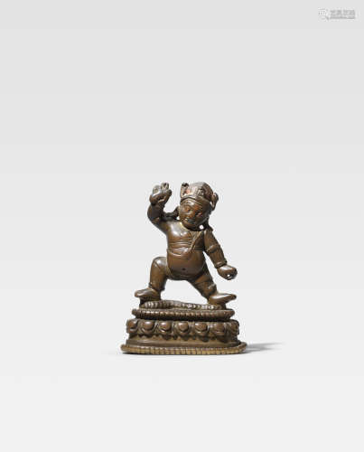 TIBET, CIRCA 13TH CENTURY A COPPER ALLOY FIGURE OF VAJRAPANI