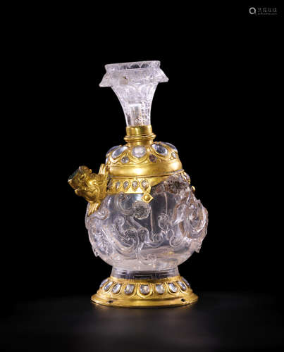 CHINA AND NEPAL, CIRCA 15TH AND 19TH CENTURY A GILT COPPER ALLOY MOUNTED ROCK CRYSTAL KUNDIKA