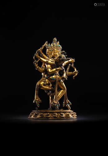 TIBET, 15TH/16TH CENTURY  A GILT COPPER ALLOY FIGURE OF MAHAMAYA