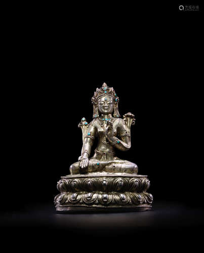 TIBET, CIRCA 14TH CENTURY A GILT SILVER FIGURE OF TARA