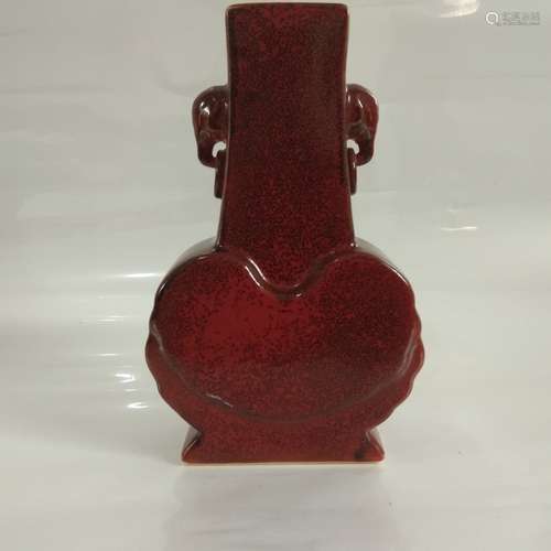 A RED GLAZED VASE WITH KANGXI MARK