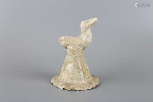 A HAN DYNASTY WHITE GLAZED BIRD ORNAMENT