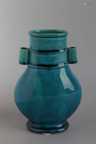 A BLUE GLAZED VASE