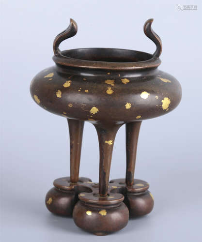 A GILT BRONZE TRIPOD CENSER