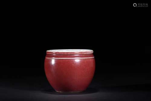 A RED GLAZED JAR