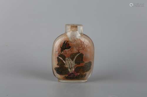 A BROWN GLASS SNUFF BOTTLE