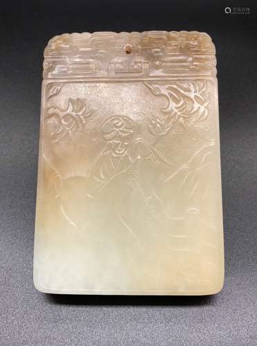 AN ARCHAIC JADE PLAQUE