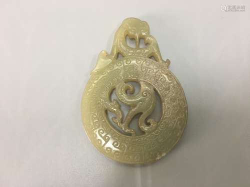 AN ARCHAIC JADE PLAQUE