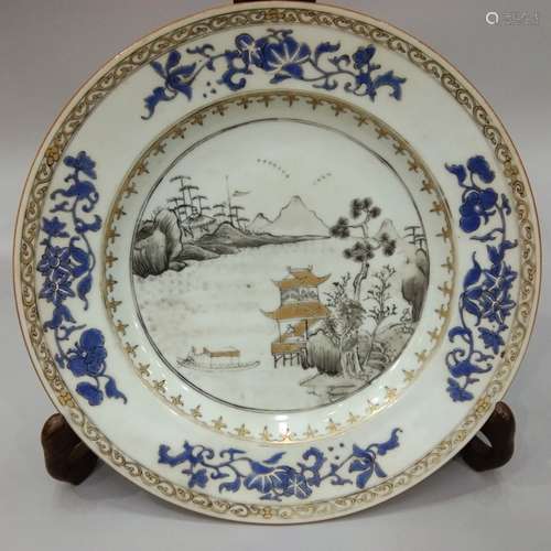 A GILT BLUE AND GRISAILLE PLATE