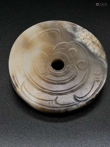 AN ARCHAIC JADE BI