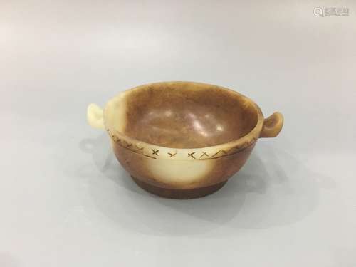 AN ARCHAIC JADE BOWL