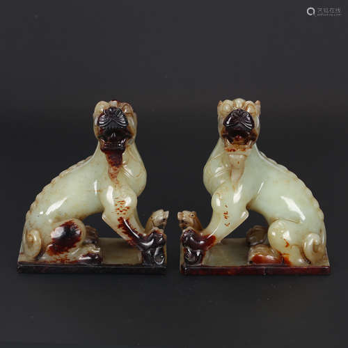 CHINESE PAIR OF JADE FOOLIONS