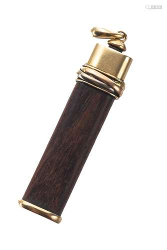 Cartier, Touch wood porte-bonheur aux 3 ors n° 129365 en ébène et or .750. H. 6 [...]