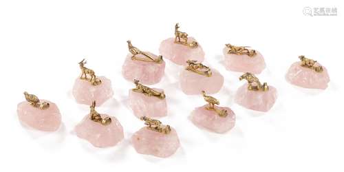 Très joli ensemble de 12 porte-noms à l'effigie de la chasse en quartz rose et [...]