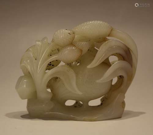 A JADE CARVED ORNAMENT