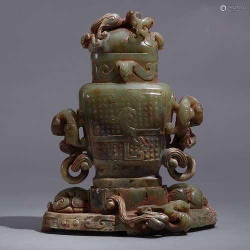 A JADE CARVED 'DRAGON' VASE AND COVER