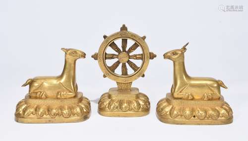 A SET OF THREE GILT-BRONZE ORNAMENT