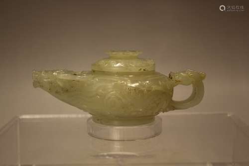 A JADE CARVED WINE POT AND COVER