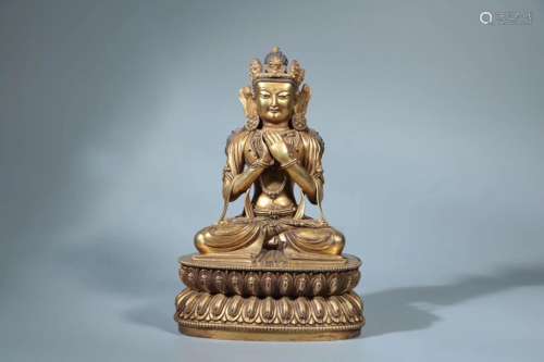 A GILT-BROZNE FIGURE OF BUDDHA