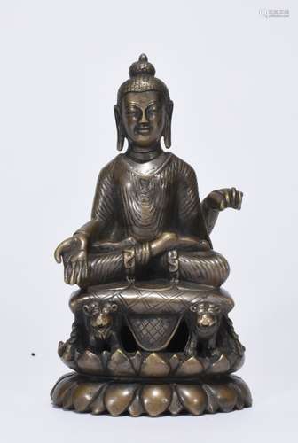 A BRONZE FIGURE OF BUDDHA