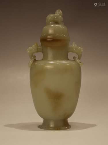 A JADE CARVED VASE AND COVER