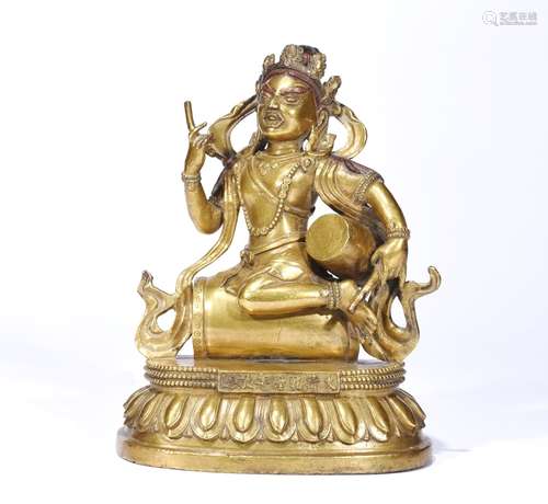 A GILT-BRONZE FIGURE OF BUDDHA