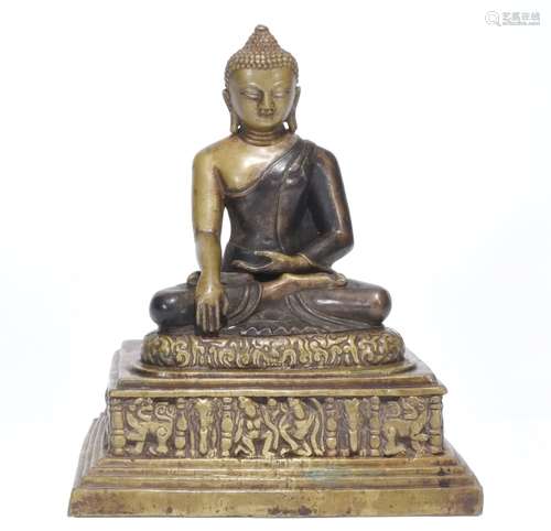 A GILT-BRONZE FIGURE OF SHAKYAMUNI