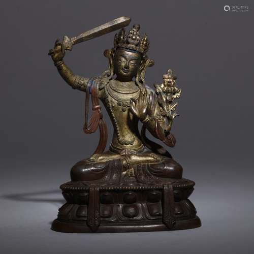 A BRONZE FIGURE OF MANJUSHRI