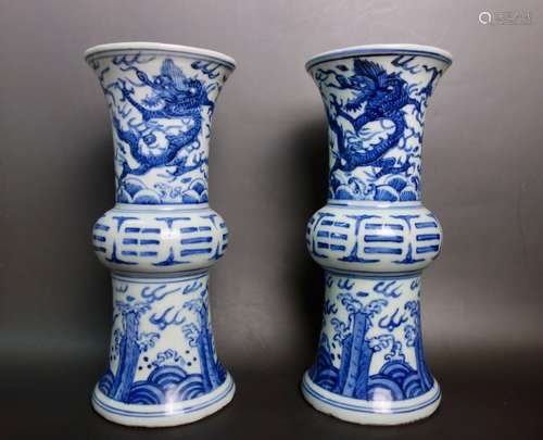 A PAIR OF BLUE AND WHITE GU VASES