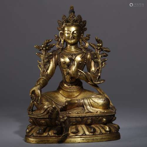 A GILT-BRONZE FIGURE OF TARA