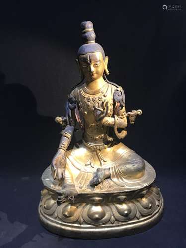 A GILT-BRONZE FIGURE OF TARA