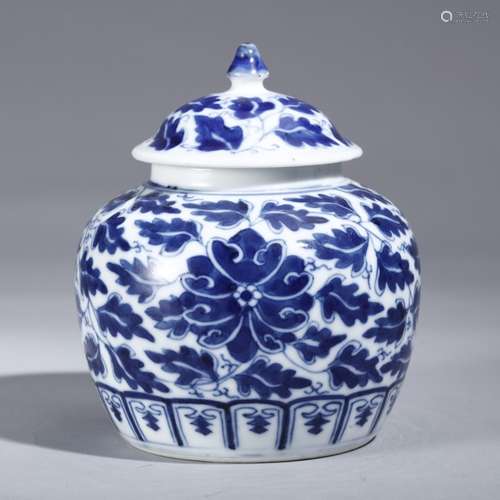 A BLUE AND WHITE JAR AND COVER