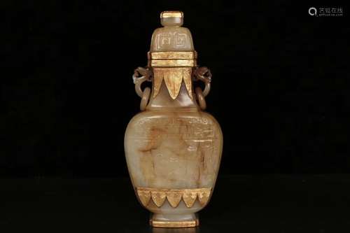 A GILT-DECORATED JADE VASE AND COVER