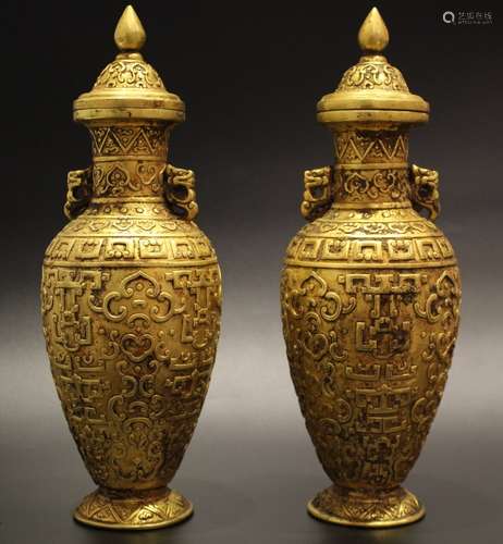 A PAIR OF GILT-BRONZE VASE AND COVER