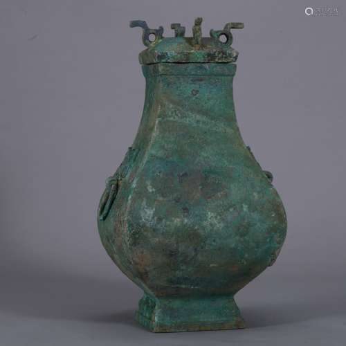 A BRONZE FACETED RITUAL VESSEL, FANGHU